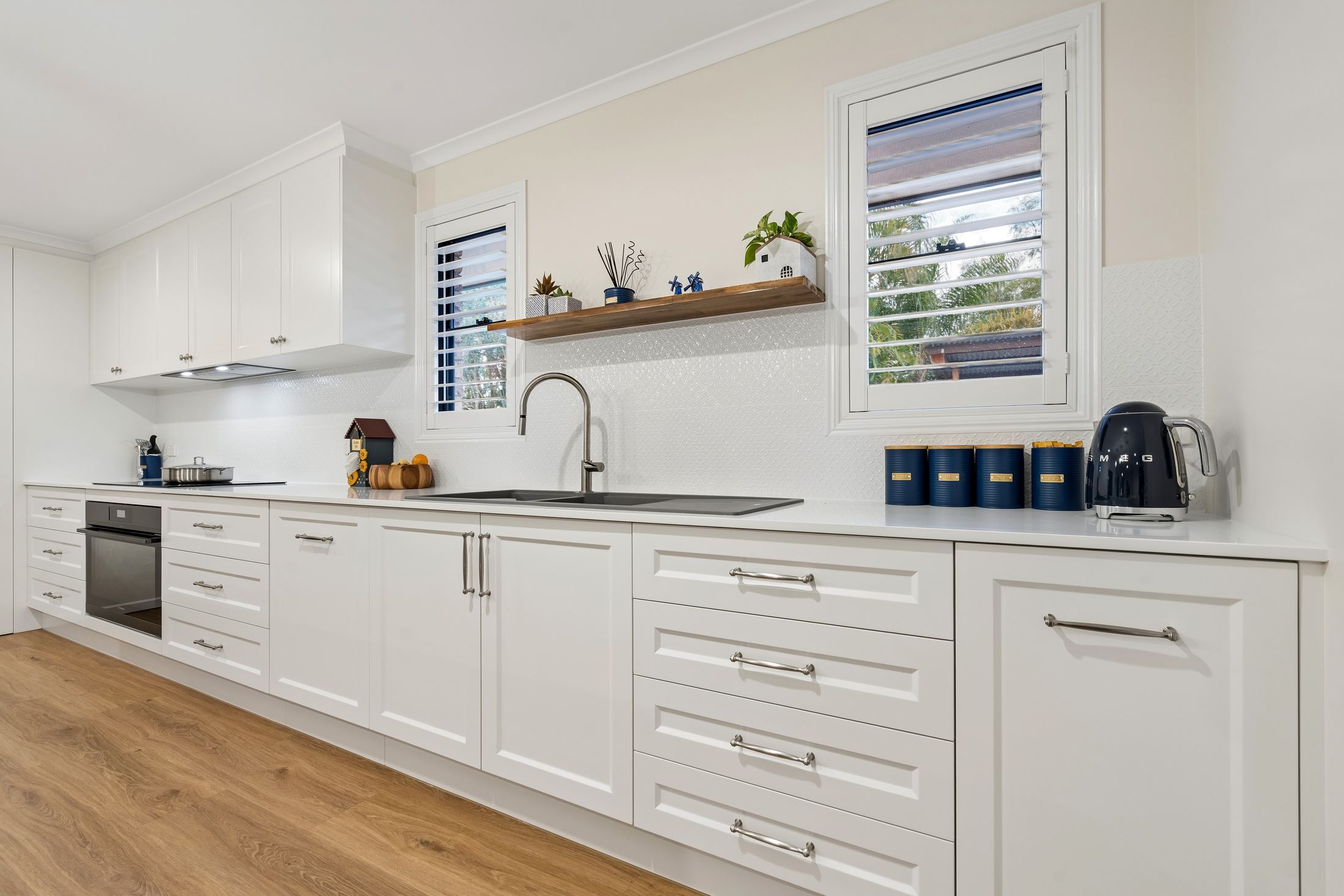 PMG Cabinetry kitchen — sink, tapware and window splashback detail